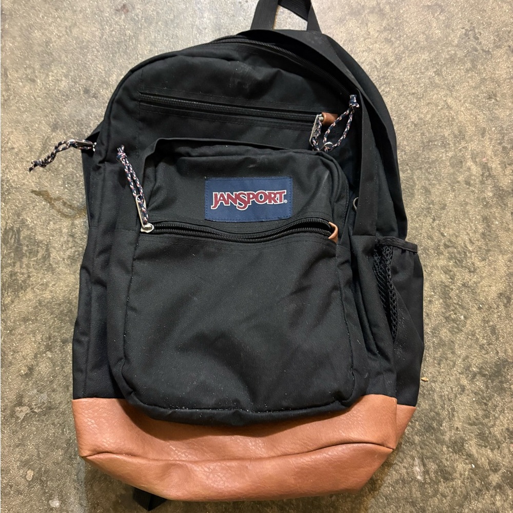 JanSport Black Backpack with Brown Accents